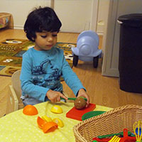 A child playing kitchen