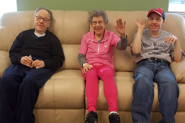 3 friends sitting on a couch